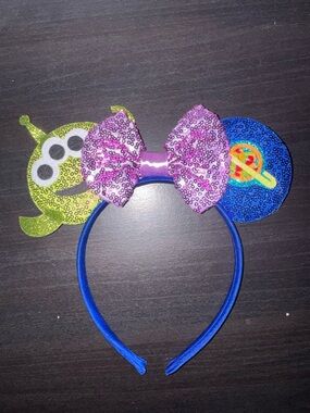Disney Blue Headband with Purple Sequin Bow and Green Alien Ear